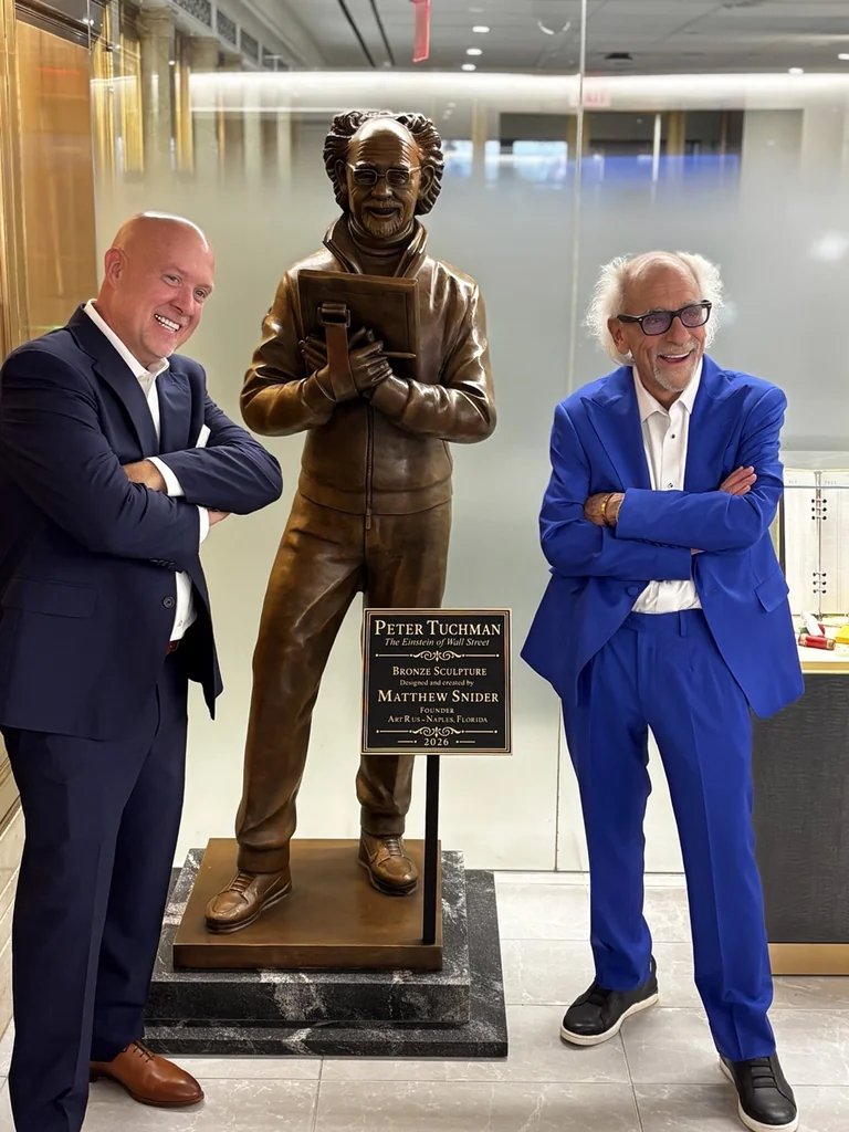 Matthew Snider and Peter Tuchman beside MARKET SAVANT inside the New York Stock Exchange
